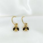 boucles d'oreilles abeille doré orné de strass noir