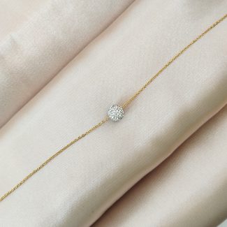 bracelet en acier inoxydable doré avec un pendentif boule ornée de strass