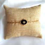 bracelet en acier inoxydable doré avec un pendentif noir orné d'une étoile