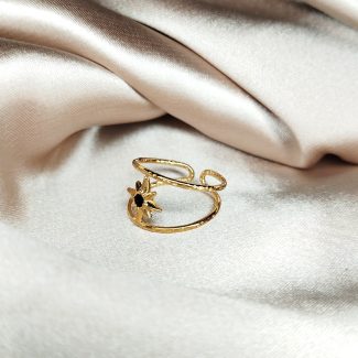 jolie bague en acier inoxydable doré orné d'une étoile et d'un strass son centre